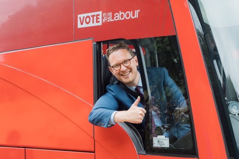 Darren Jones in the driving seat of the General Election battle bus